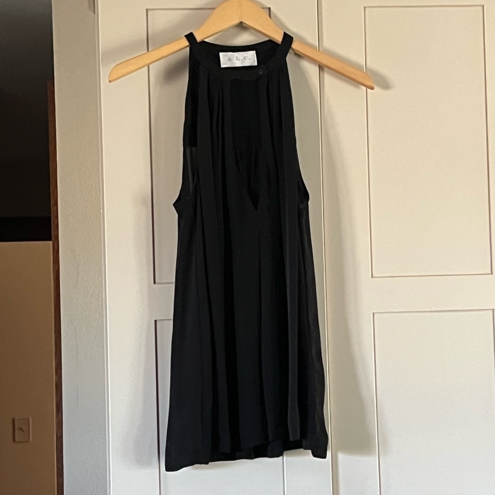 A. L. C. Black silk halter neck top with front loophole (pretty low cut) size S